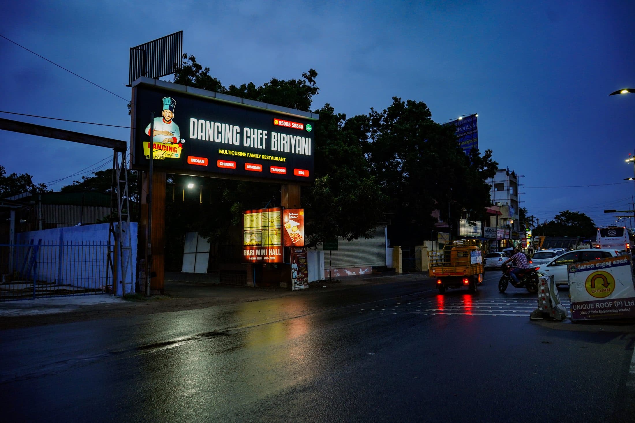 The restaurant and its lit signage at dusk — Dancing Chef Biriyani, Coimbatore (7)